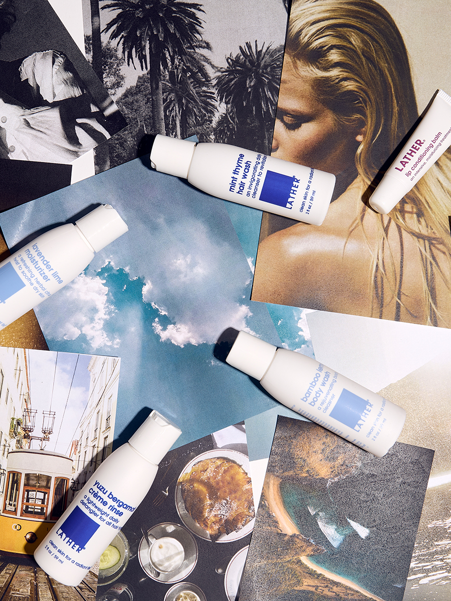 Flat lay of miniature Lather travel bottles arranged over a collage of black-and-white and sky photographs.