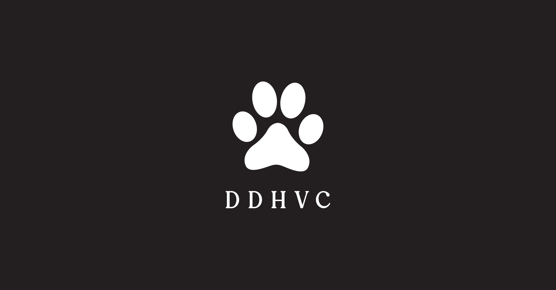 DDHVC logo — a white paw print above the letter-spaced wordmark 'DDHVC' in a serif typeface — on a solid charcoal background.